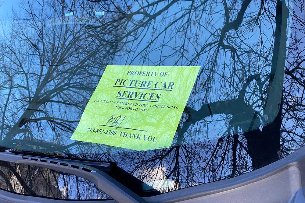 Law and Order prop cars come with parking placards begging to avoid tickets