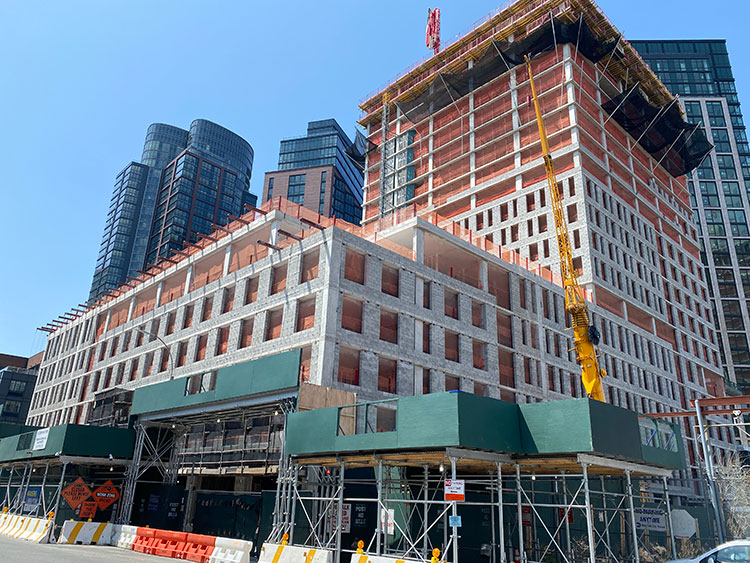 33 Commercial Street in Greenpoint rises quickly along the waterfront with the tower rising on the back side of hte building