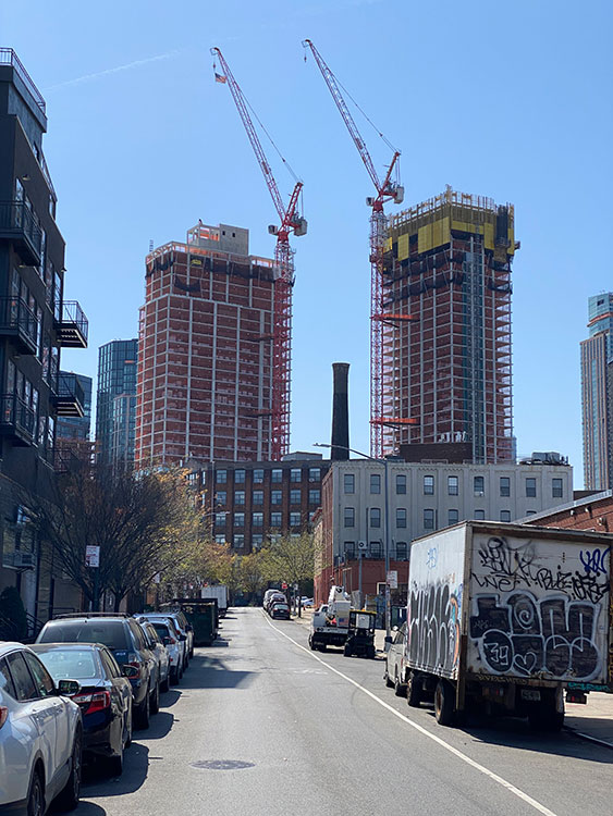 77 Commercial Street in Greenpoint grows tall over the low rise neighborhood of greenpoint