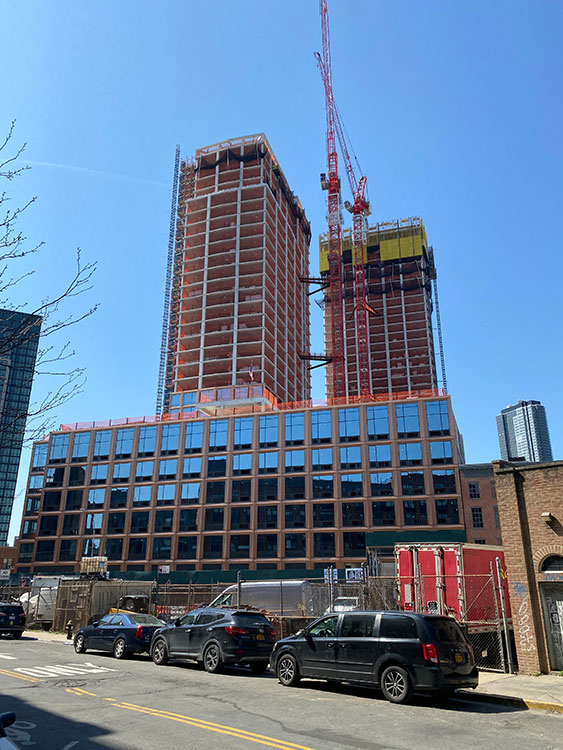77 Commercial Street in Greenpoint obscures the towers of Long Island City