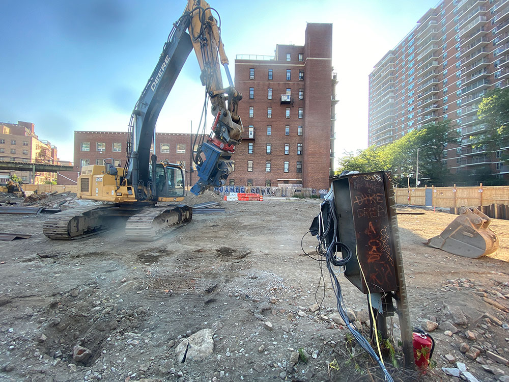 pilings and equipment arrive on site