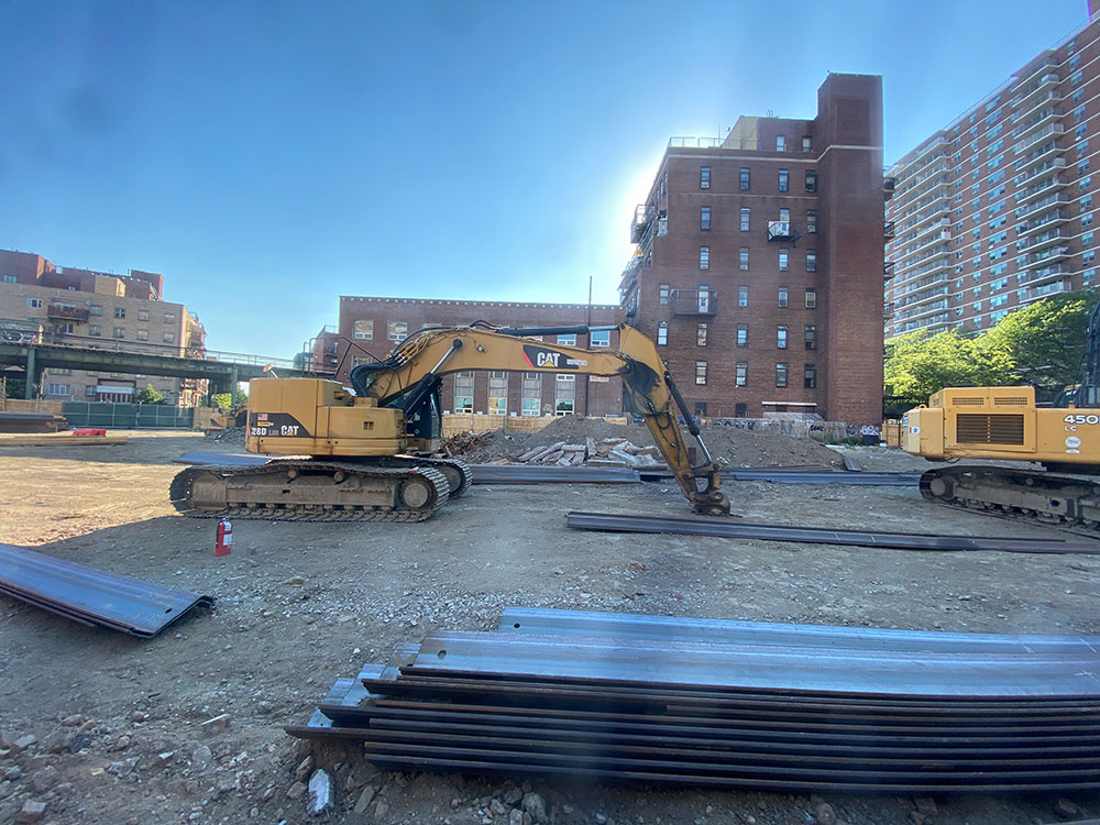 pilings and equipment arrive on site