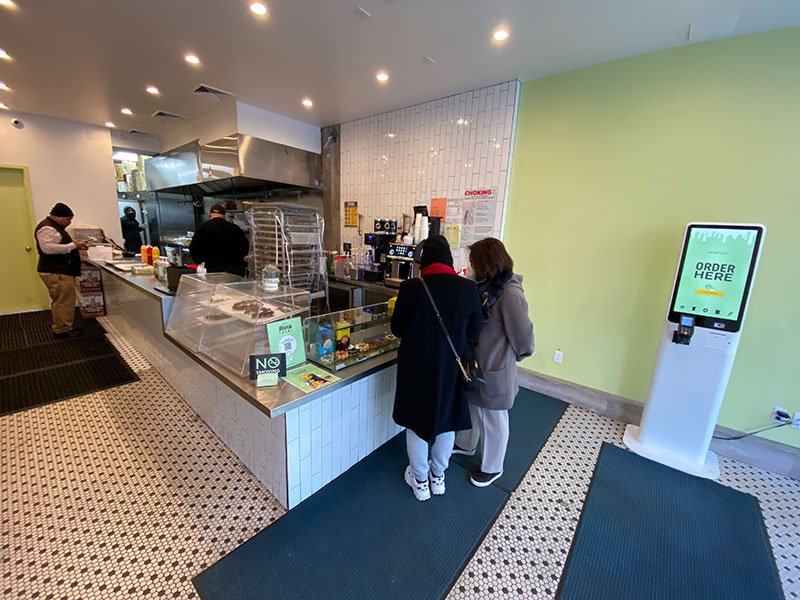 interior of Afternoon has a counter, but ordering is done through the electronic kiosk