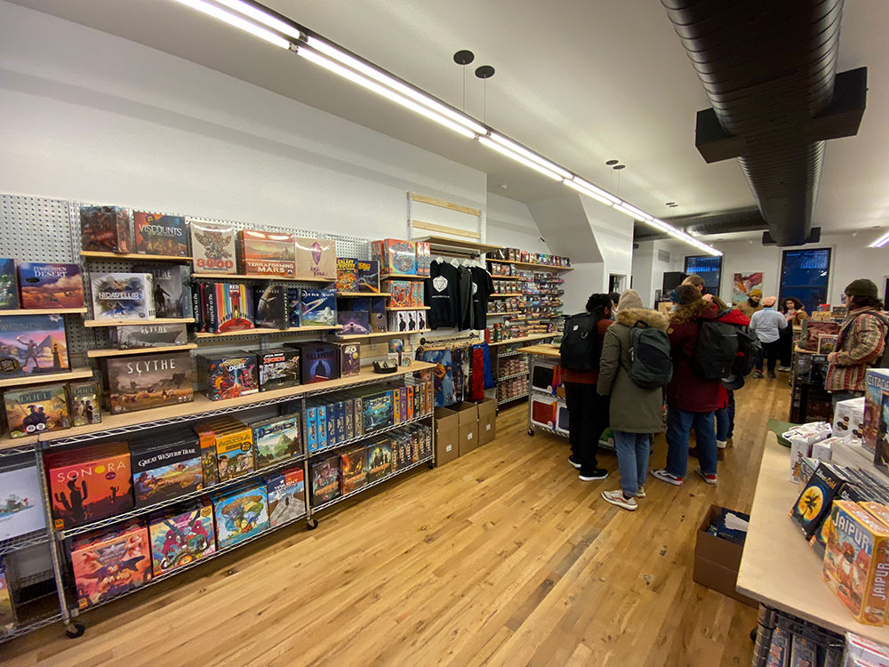 Twenty side store has a new location for the game store one block west on Grand STreet